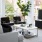 a living room with a tv and couches