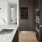 a kitchen with black cabinets